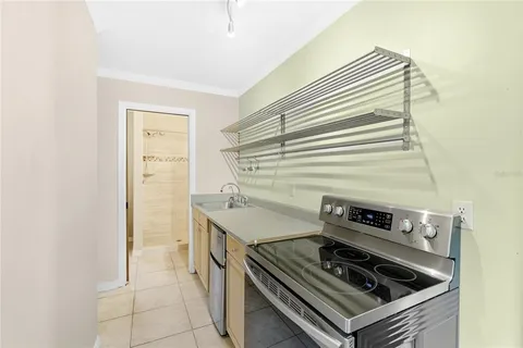 a kitchen with a sink and a window