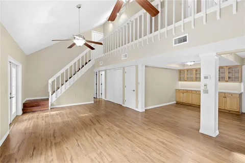 a view of an entryway with wooden floor