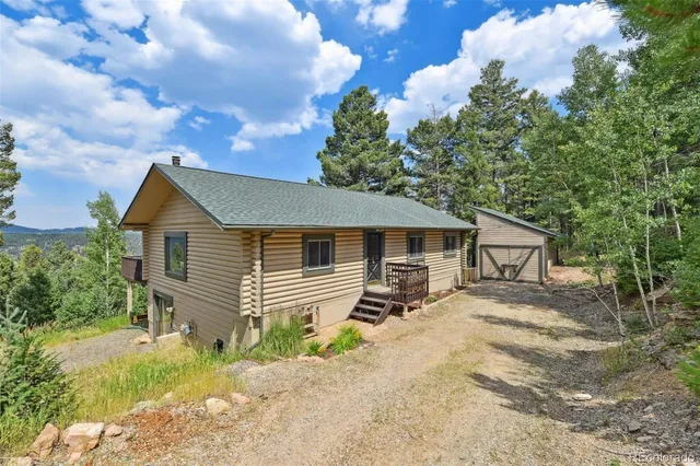 a front view of a house with yard