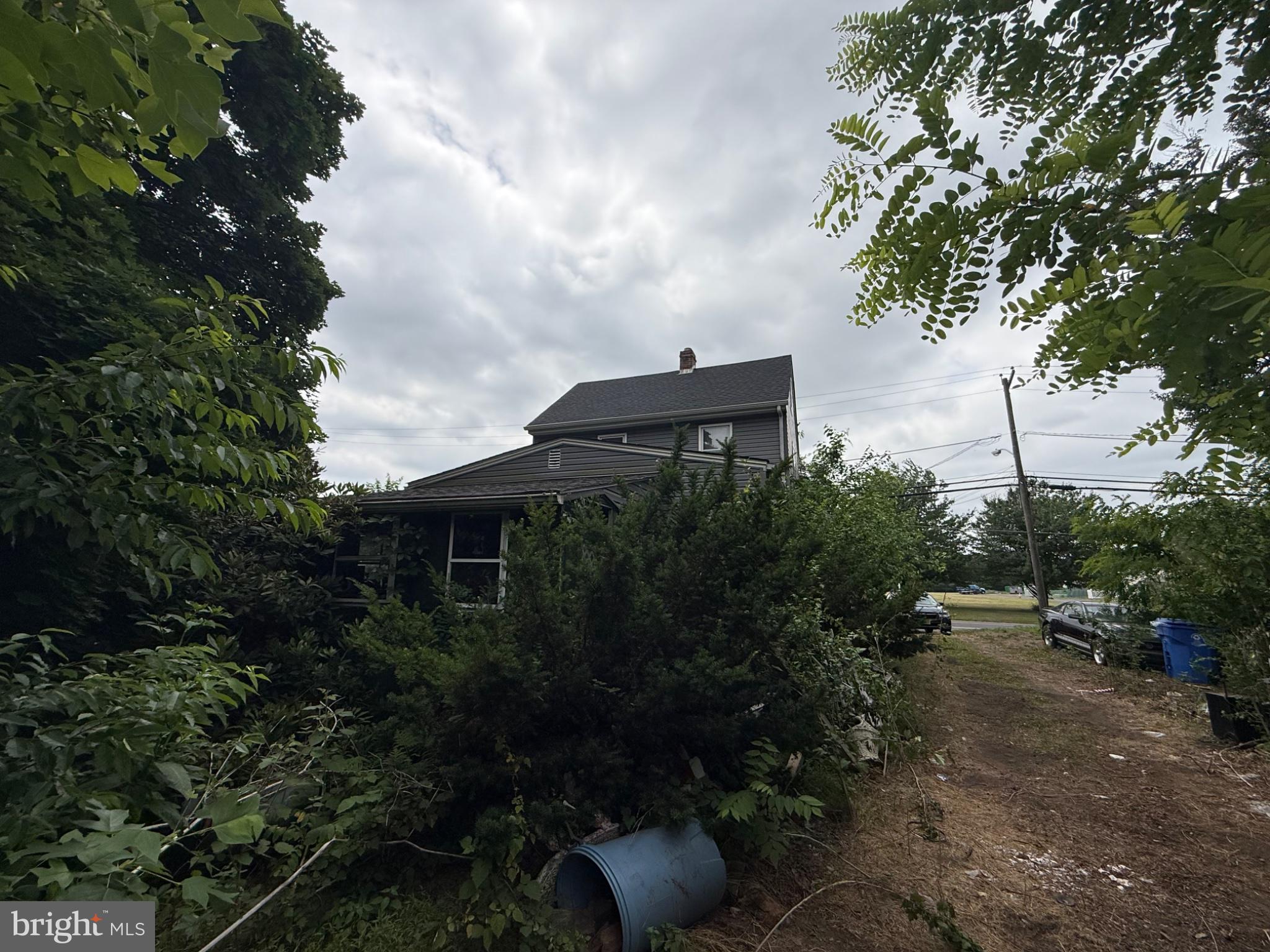 677 Monmouth Road Wrightstown, NJ 08562 - Photo 2 of 7 Charming home nestled in nature's embrace.