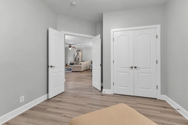 a view of a livingroom from a hallway