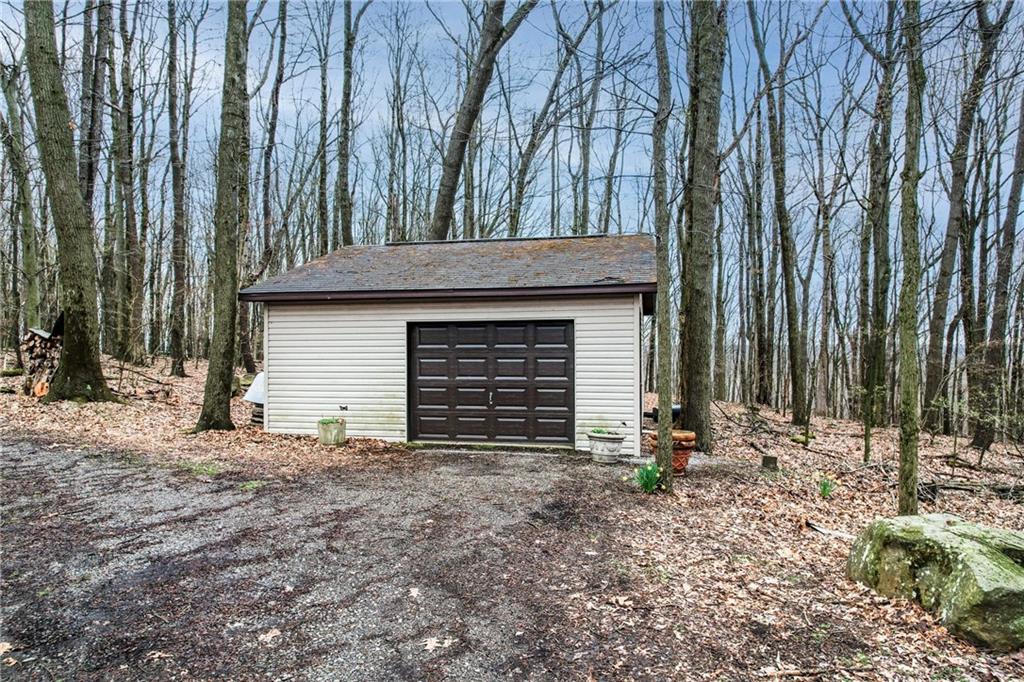 692 Mitchell Hill Road Greenville, PA 16125 - Photo 13 of 49 a view of a house with backyard and trees
