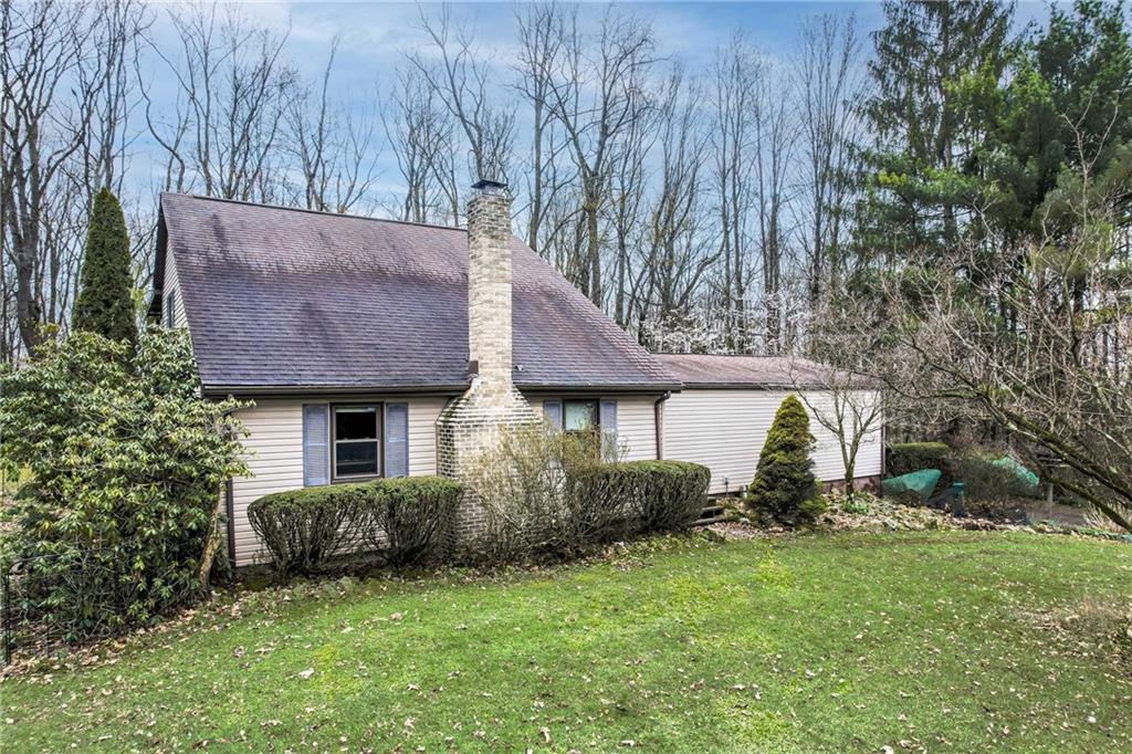 692 Mitchell Hill Road Greenville, PA 16125 - Photo 2 of 49 a backyard of a house with lots of green space