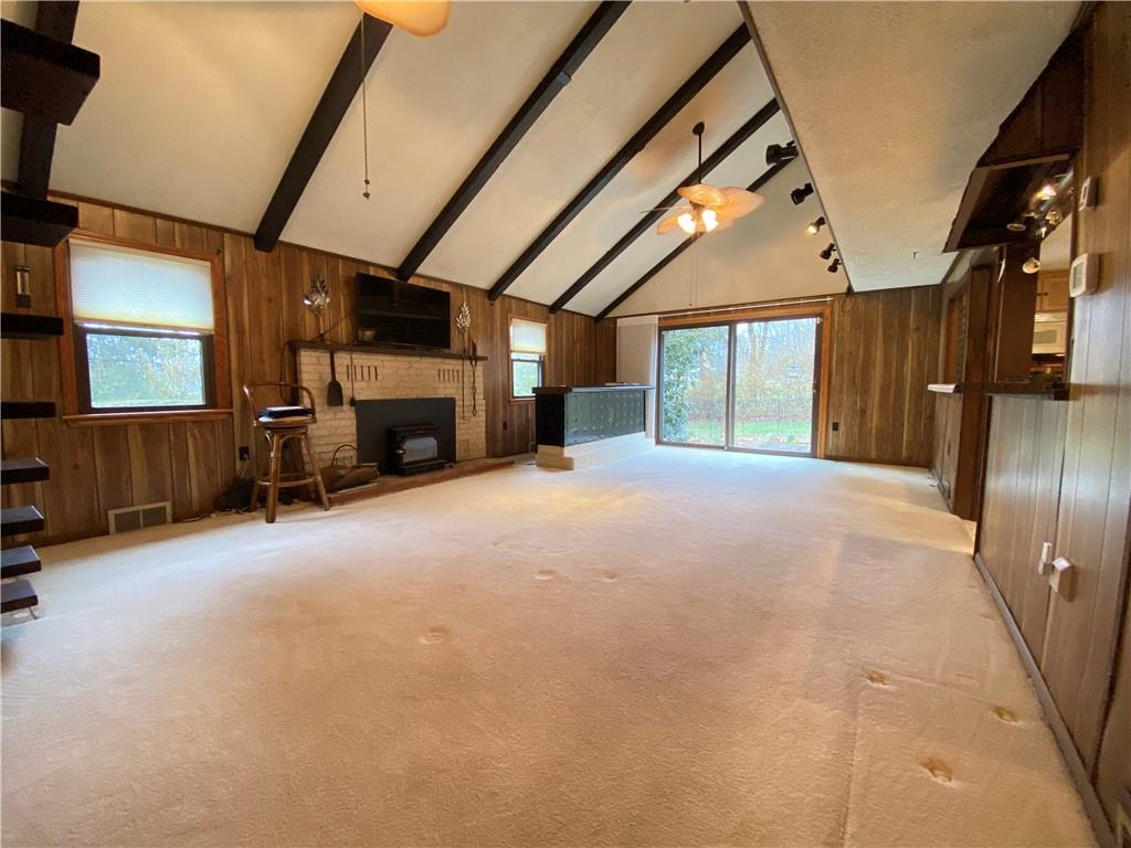692 Mitchell Hill Road Greenville, PA 16125 - Photo 25 of 49 a view of a livingroom with furniture a flat screen tv