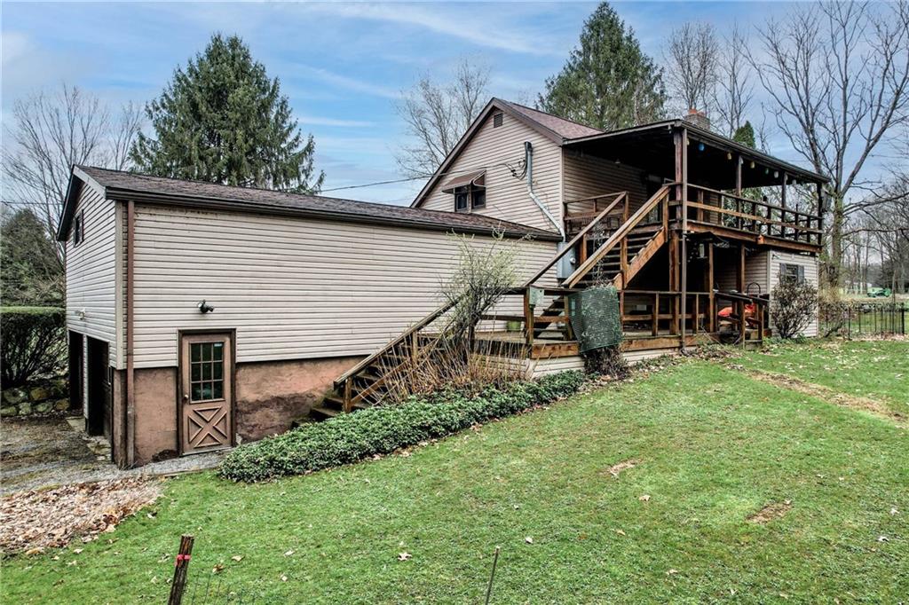 692 Mitchell Hill Road Greenville, PA 16125 - Photo 7 of 49 a view of a house with a yard