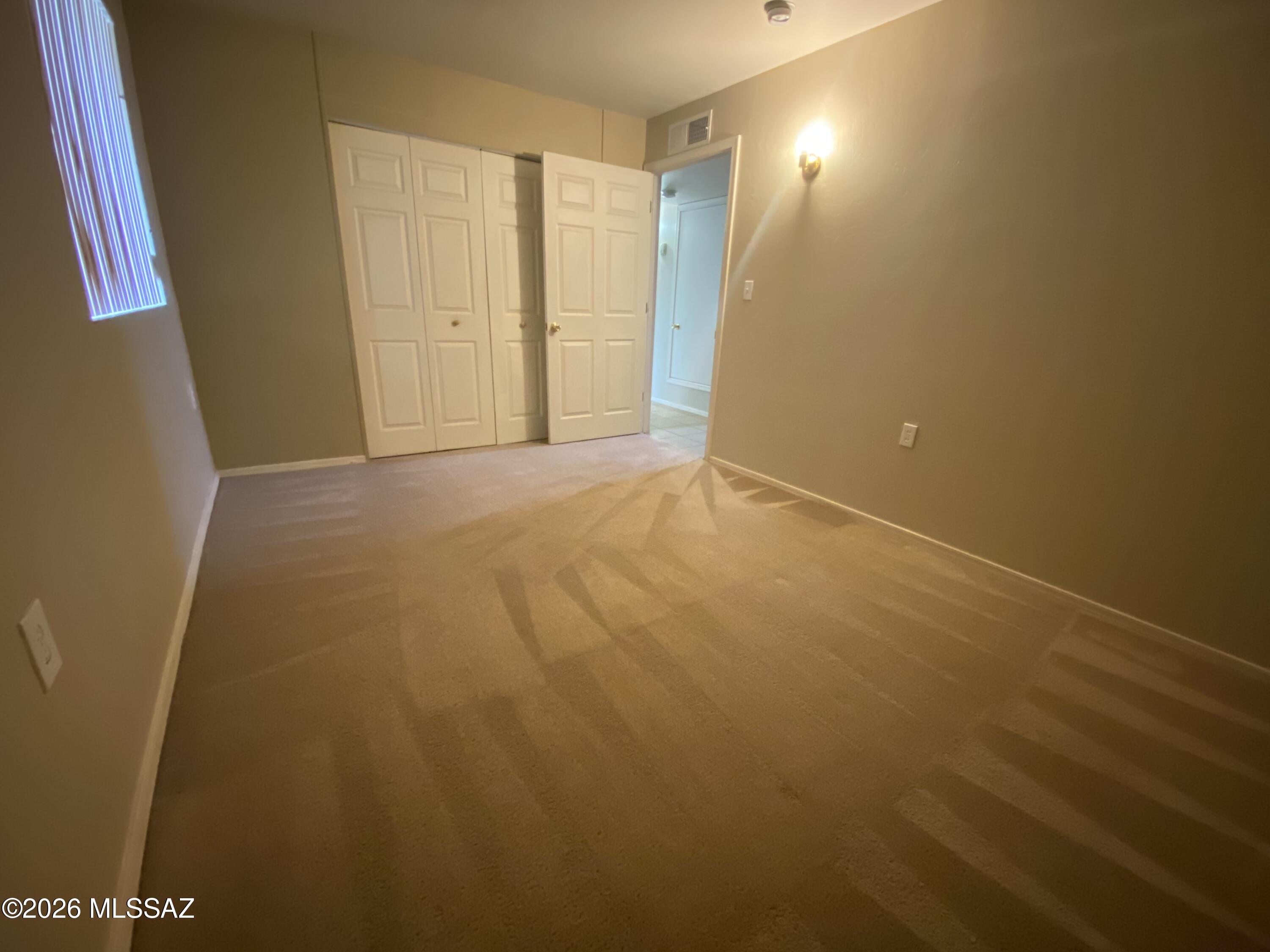 350 North Silverbell Road, Unit 94 Tucson, AZ 85745 - Photo 8 of 15 a view of an empty room