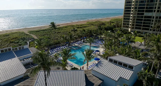 a view of a balcony with an ocean view