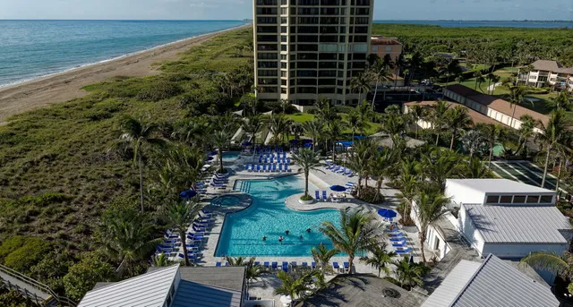a view of a workspace with furniture