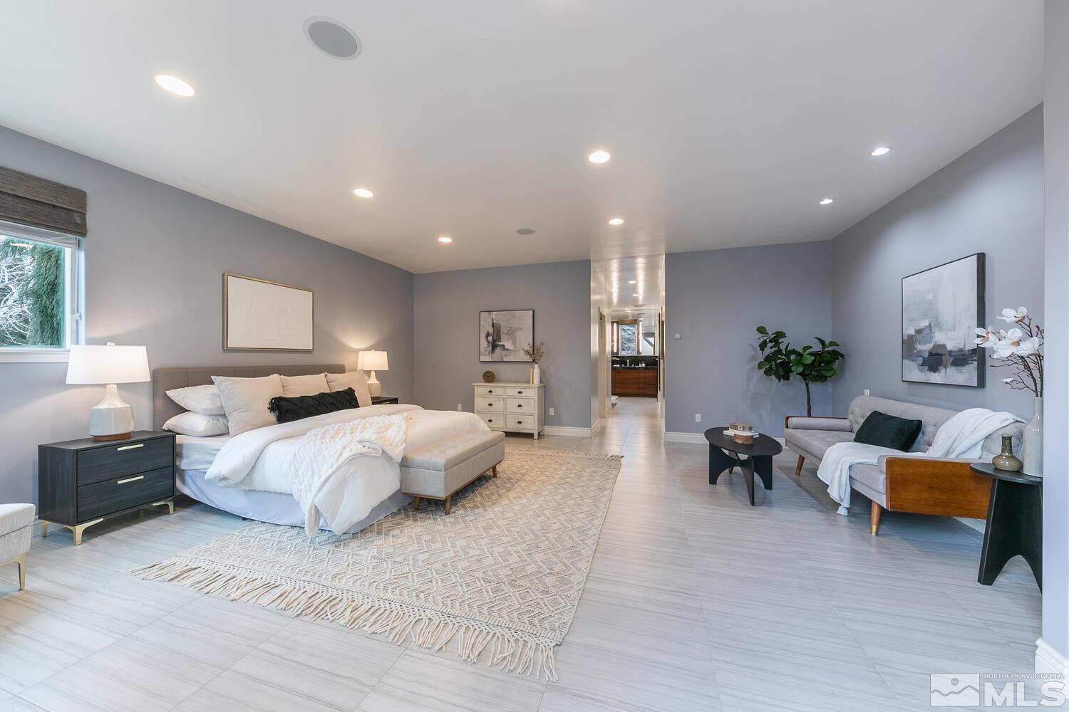 220 Brunswick Mill Road Reno, NV 89511 - Photo 23 of 39 a bed room with furniture and a large mirror