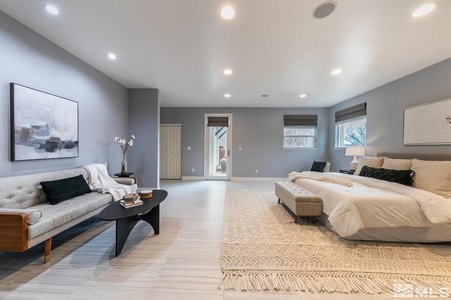 220 Brunswick Mill Road Reno, NV 89511 - Photo 24 of 39 a bedroom with furniture and a wooden floor