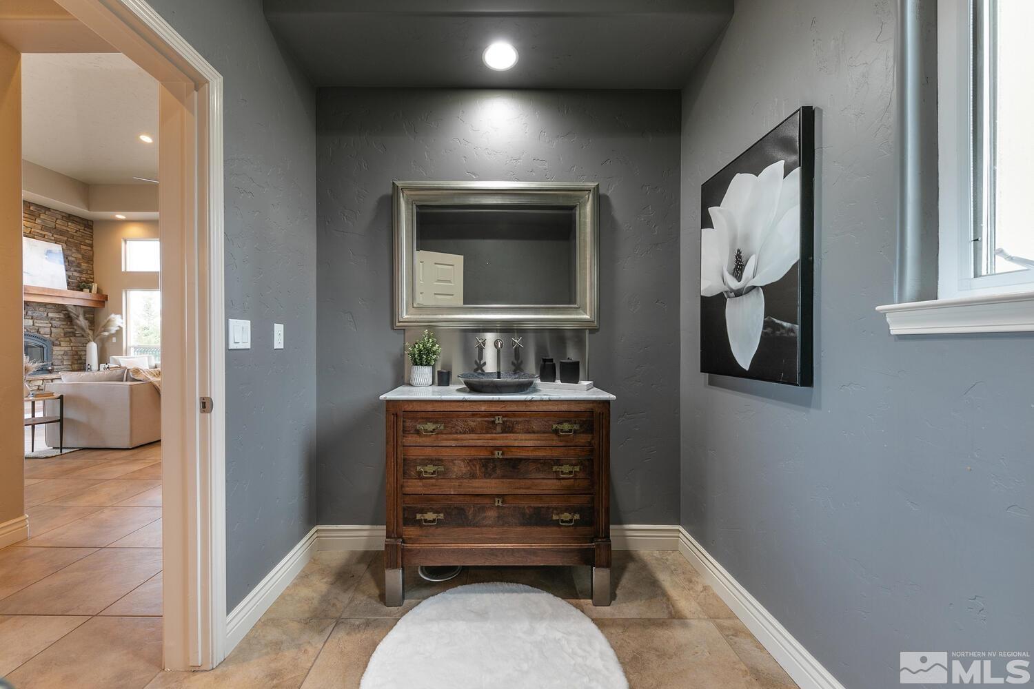 220 Brunswick Mill Road Reno, NV 89511 - Photo 28 of 39 a room with a dresser and a mirror