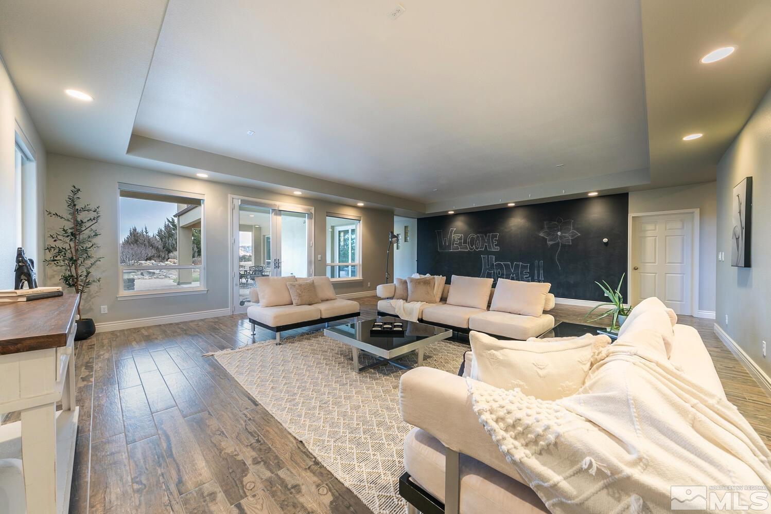 220 Brunswick Mill Road Reno, NV 89511 - Photo 30 of 39 a living room with furniture and a large window