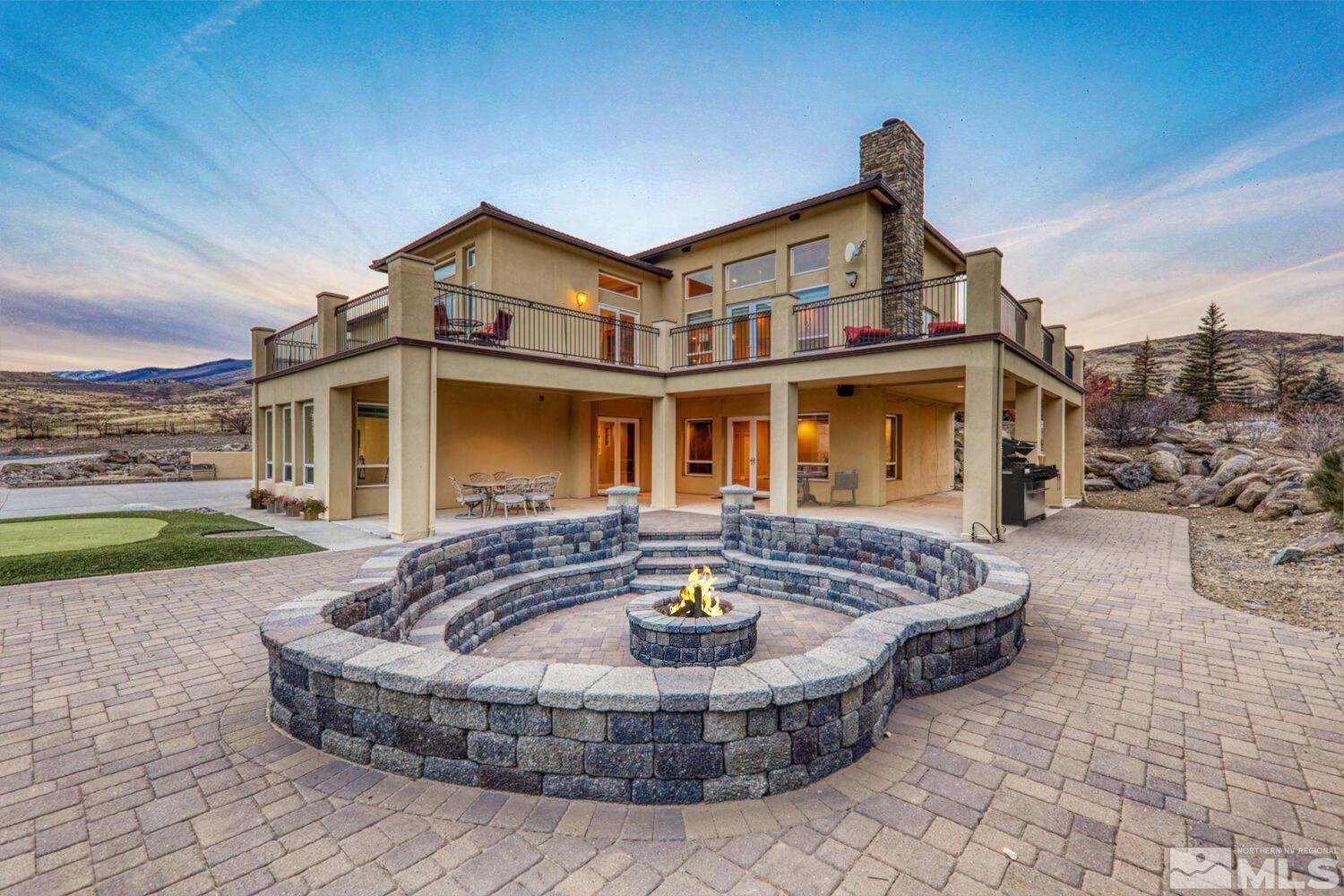 220 Brunswick Mill Road Reno, NV 89511 - Photo 3 of 39 a front view of a house with swimming pool