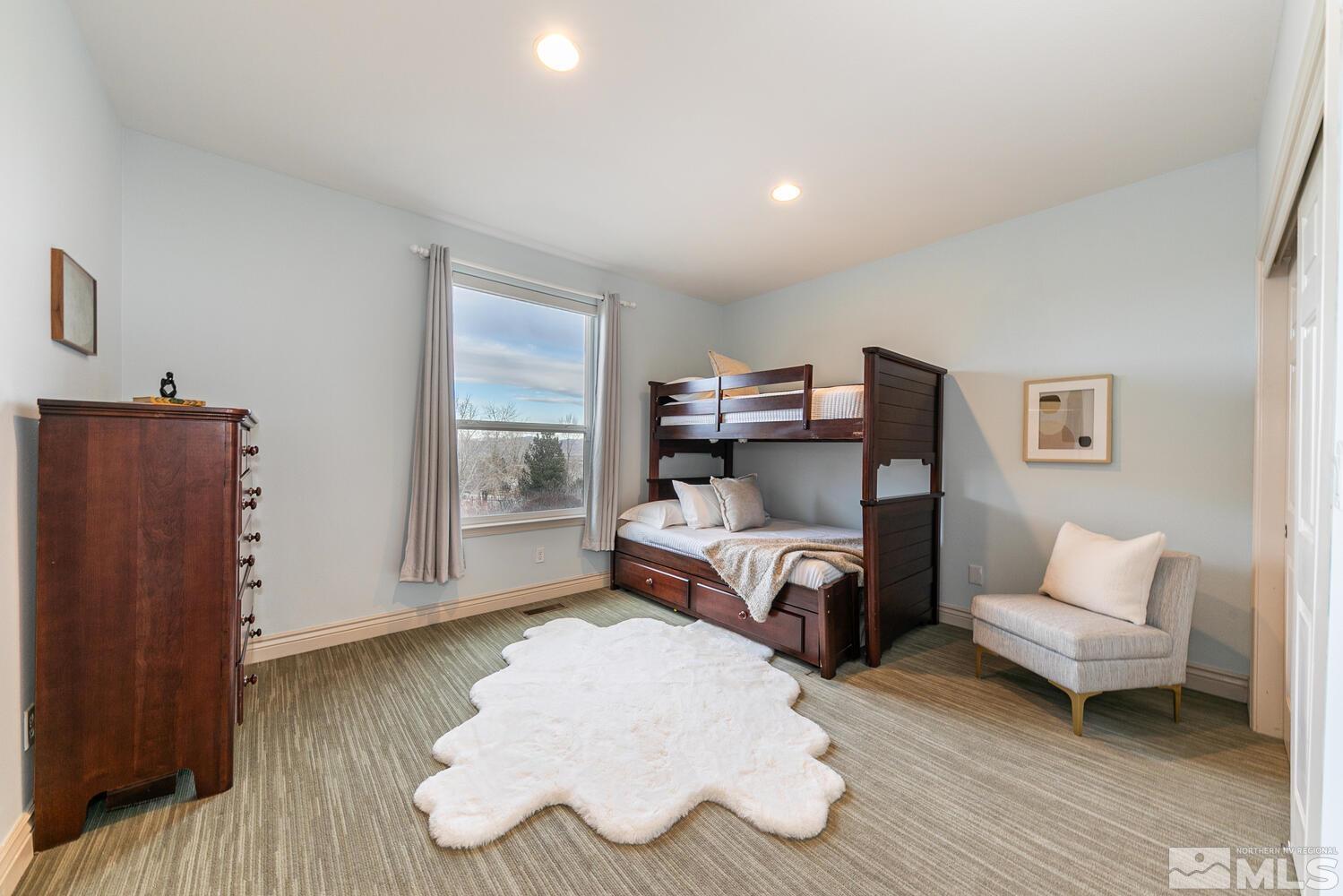 220 Brunswick Mill Road Reno, NV 89511 - Photo 31 of 39 a bedroom with furniture and wooden floor