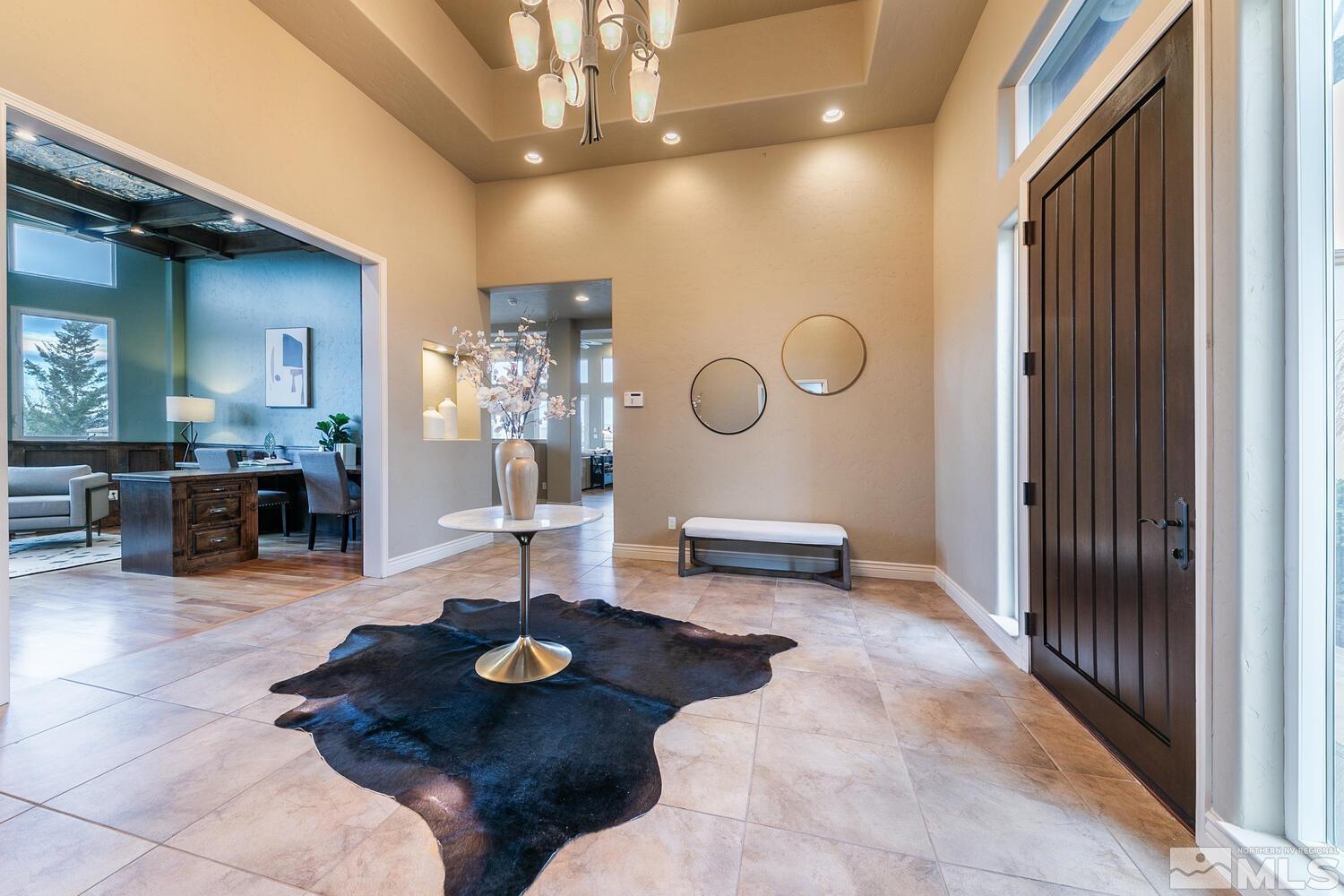 220 Brunswick Mill Road Reno, NV 89511 - Photo 9 of 39 a living room with furniture and a fireplace