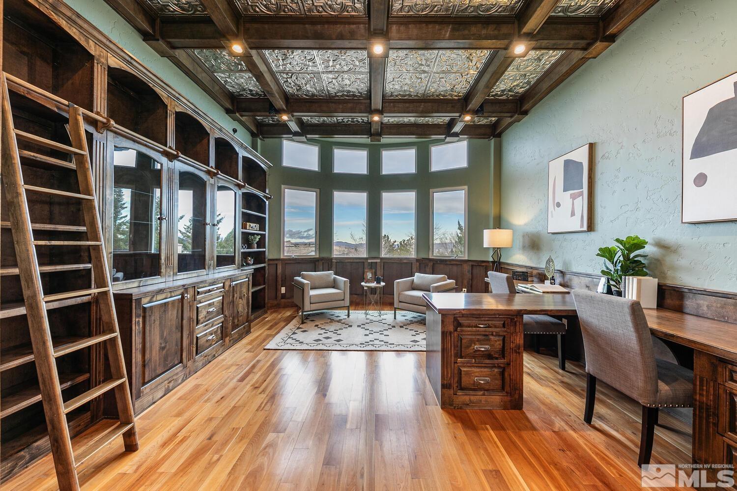 220 Brunswick Mill Road Reno, NV 89511 - Photo 10 of 39 a very nice looking room with wooden floor and furniture