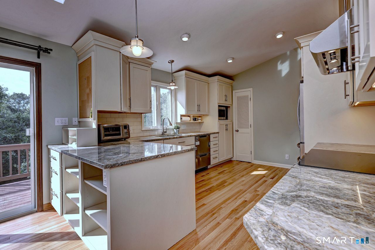 90 Brook Hill Road Hamden, CT 06514 - Photo 19 of 36 Kitchen remolded with new cabinets, stainless steel appliances, granite counters, hardwood floor