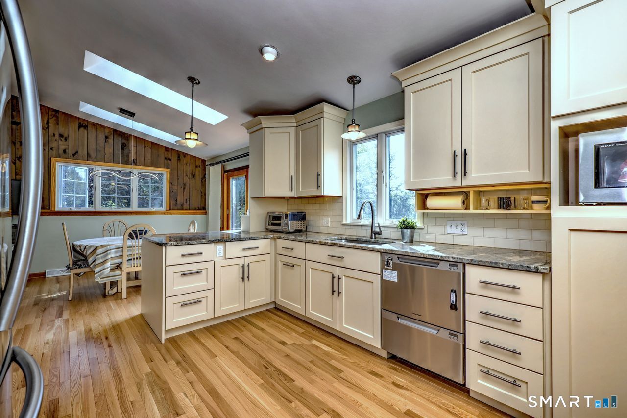 90 Brook Hill Road Hamden, CT 06514 - Photo 24 of 36 Kitchen remolded with new cabinets, stainless steel appliances, granite counters, hardwood floor