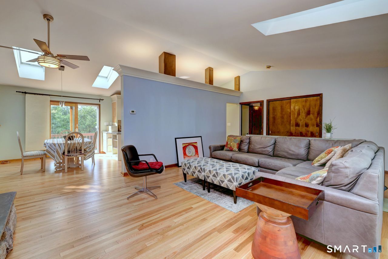 90 Brook Hill Road Hamden, CT 06514 - Photo 33 of 36 a living room with furniture and wooden floor