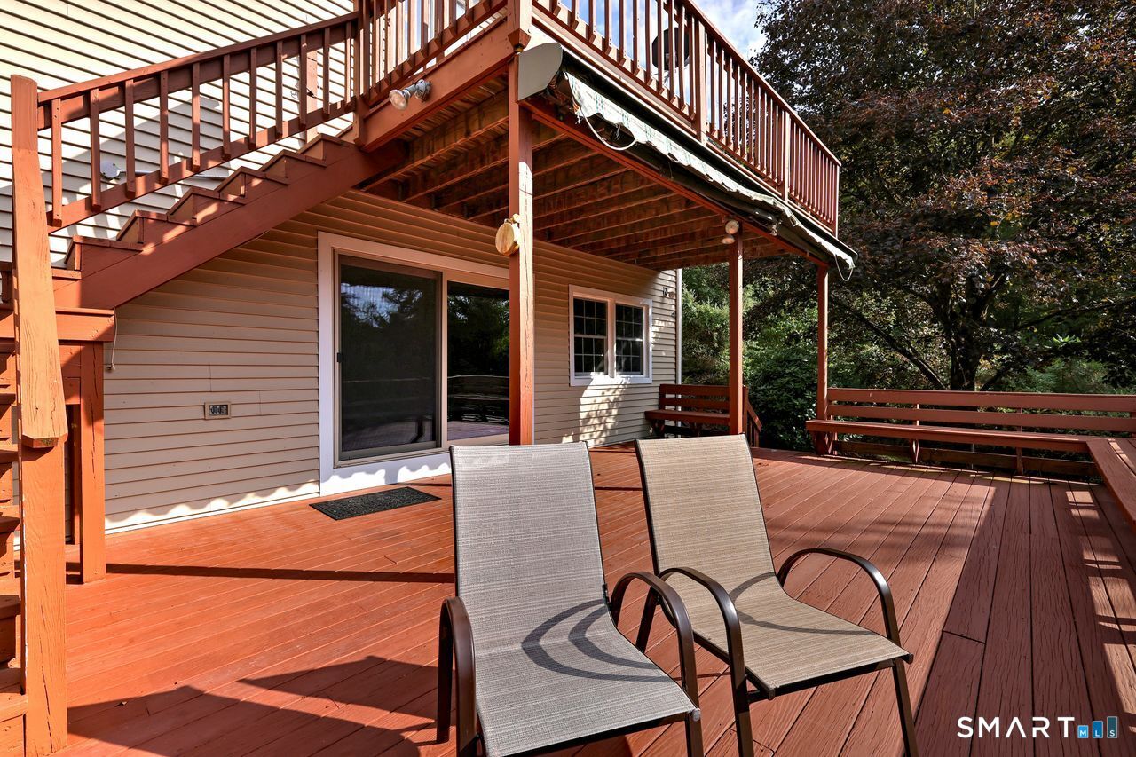90 Brook Hill Road Hamden, CT 06514 - Photo 7 of 36 a patio with table and chairs