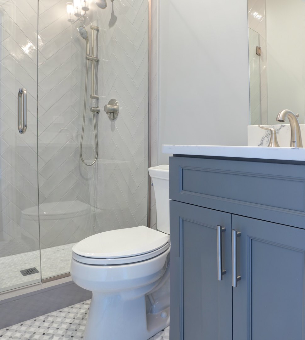 733 West Melrose Street, Unit 2 Chicago, IL 60657 - Photo 11 of 18 a bathroom with a toilet and a shower