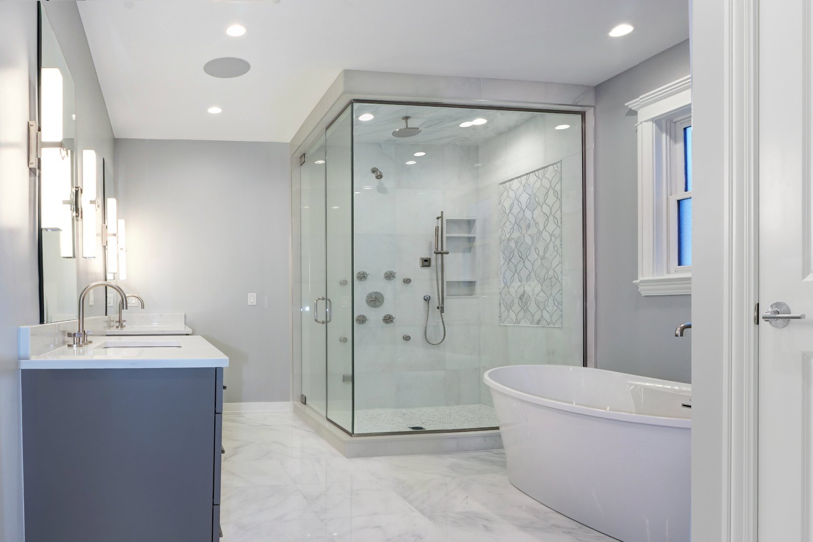 733 West Melrose Street, Unit 2 Chicago, IL 60657 - Photo 7 of 18 a bathroom with a glass shower door and a sink