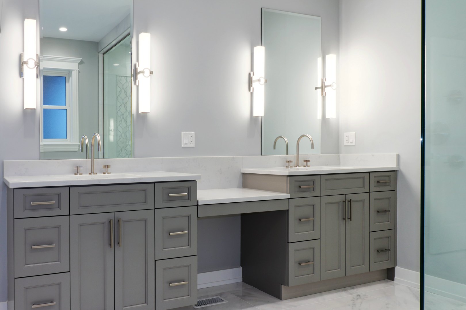 733 West Melrose Street, Unit 2 Chicago, IL 60657 - Photo 8 of 18 a bathroom with a double vanity sink mirror and