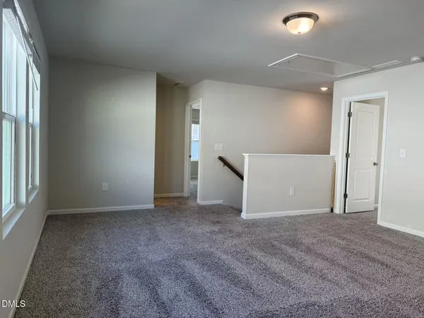 a bathroom with a sink vanity and a mirror