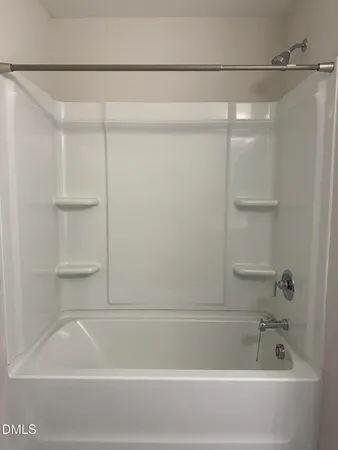 an empty room that has a window