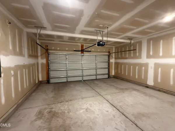 a front view of a house with a garage