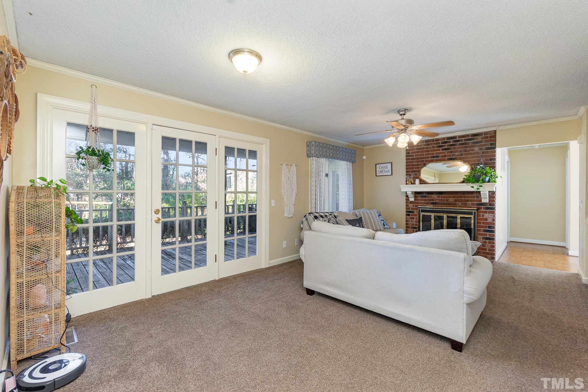 2904 Hodges Road Kinston, NC 28504 - Photo 14 of 29 a living room with furniture and a fireplace
