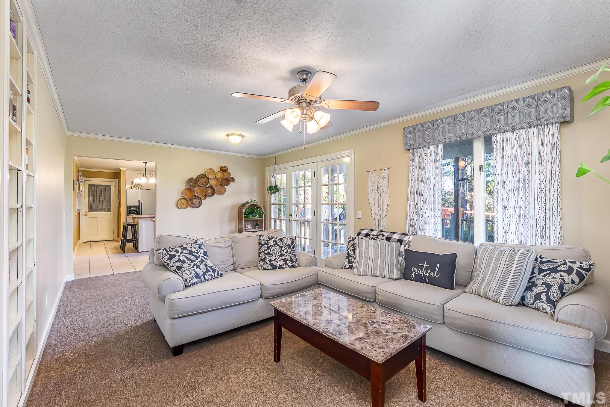 2904 Hodges Road Kinston, NC 28504 - Photo 15 of 29 a living room with furniture and a large window