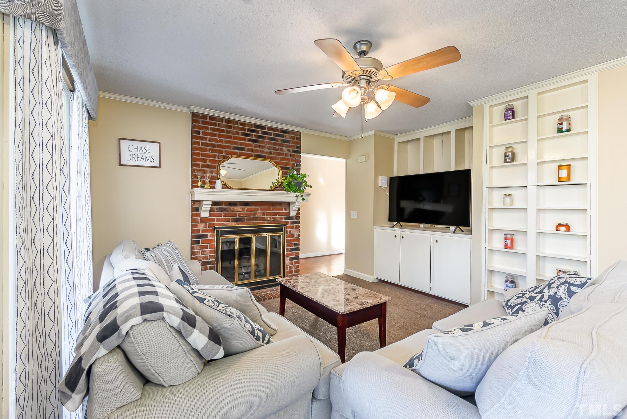 2904 Hodges Road Kinston, NC 28504 - Photo 16 of 29 a living room with furniture and a flat screen tv