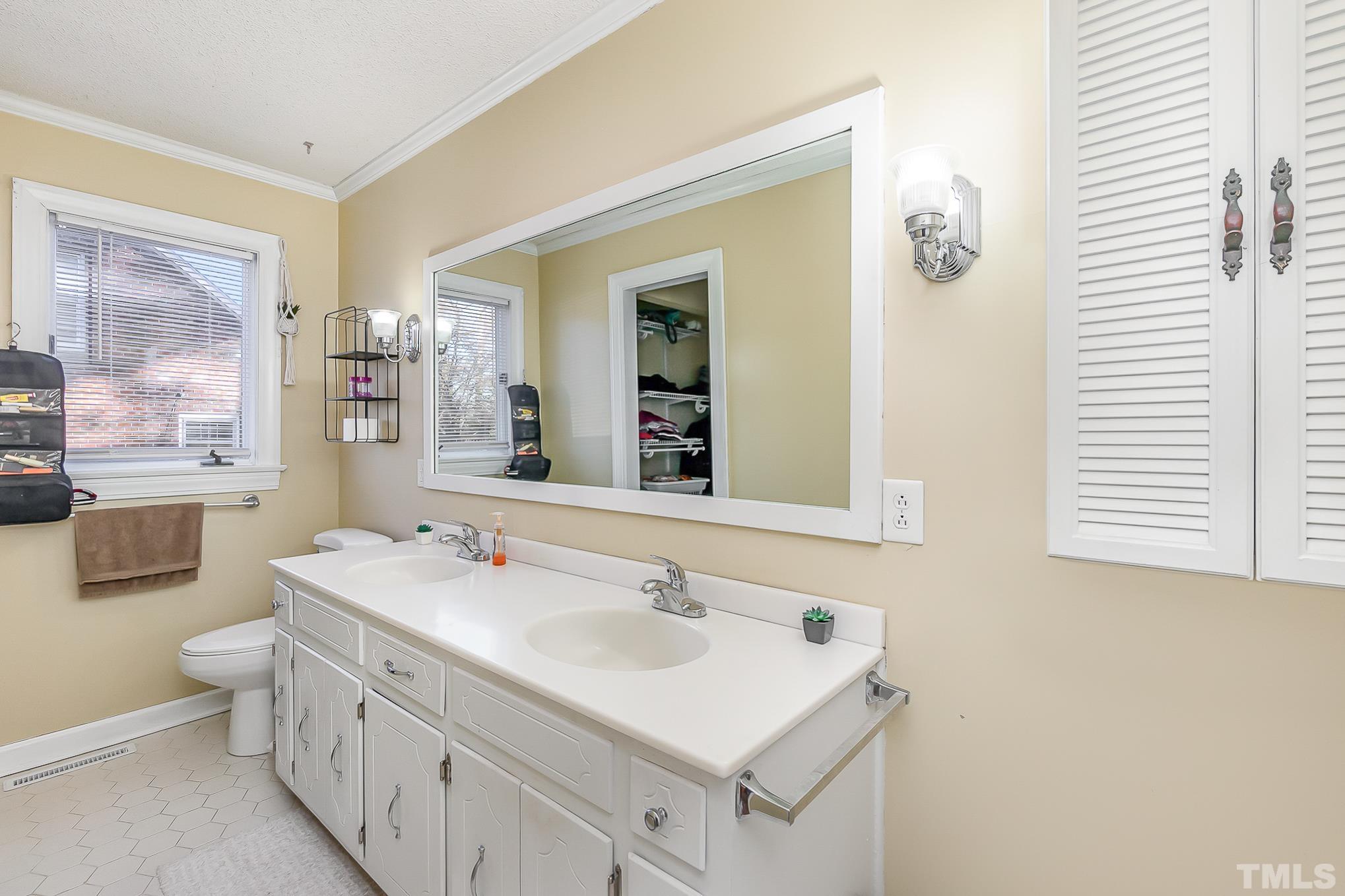 2904 Hodges Road Kinston, NC 28504 - Photo 19 of 29 a bathroom with a sink and a mirror