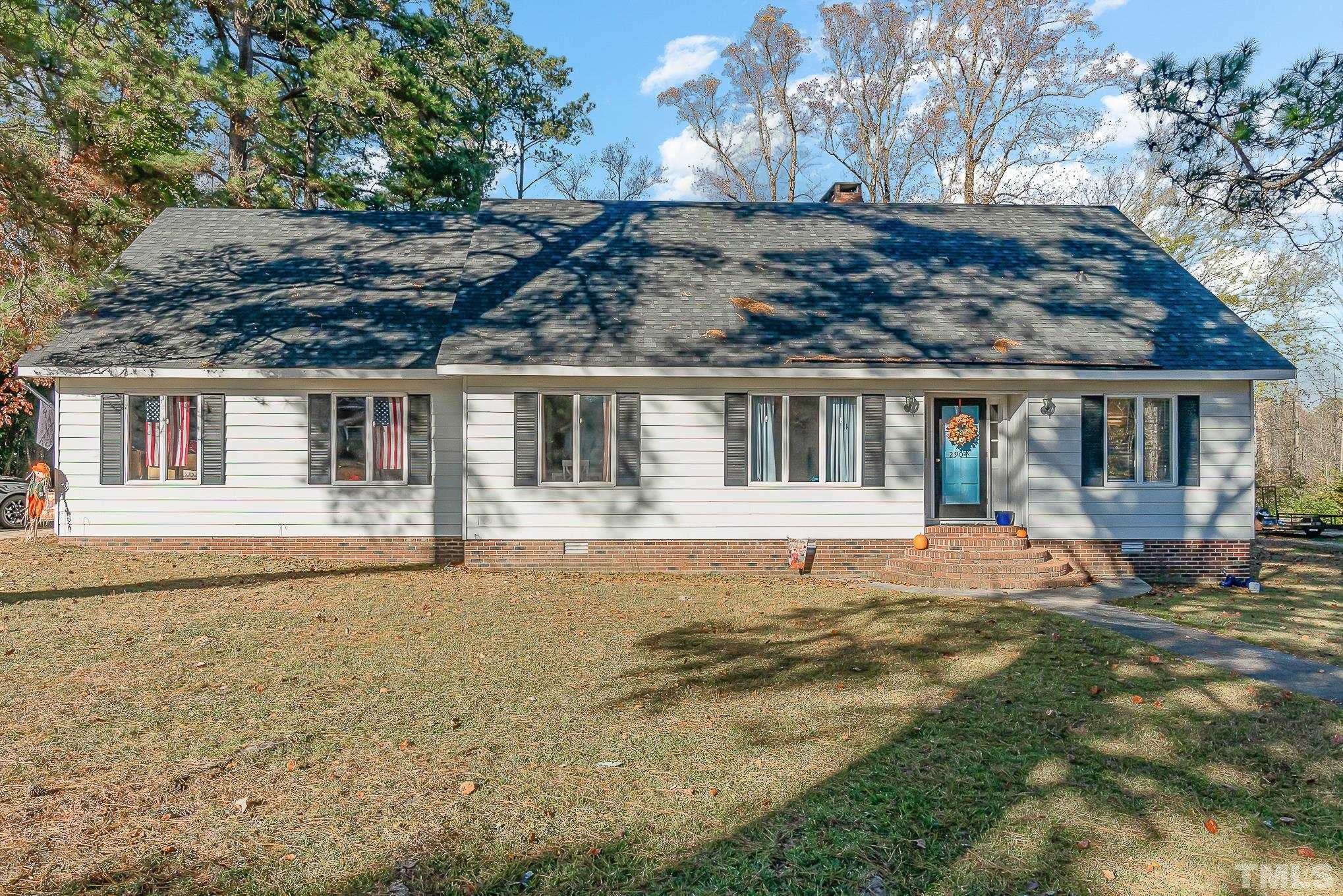 2904 Hodges Road Kinston, NC 28504 - Photo 2 of 29 a house with trees in the background
