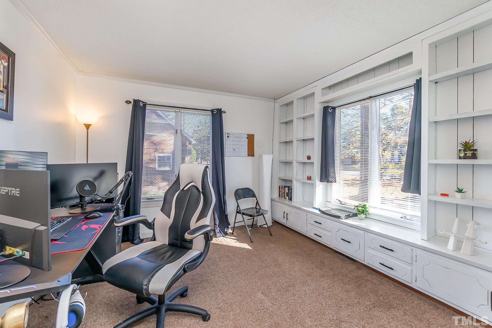 2904 Hodges Road Kinston, NC 28504 - Photo 7 of 29 a view of a workspace with furniture and a window