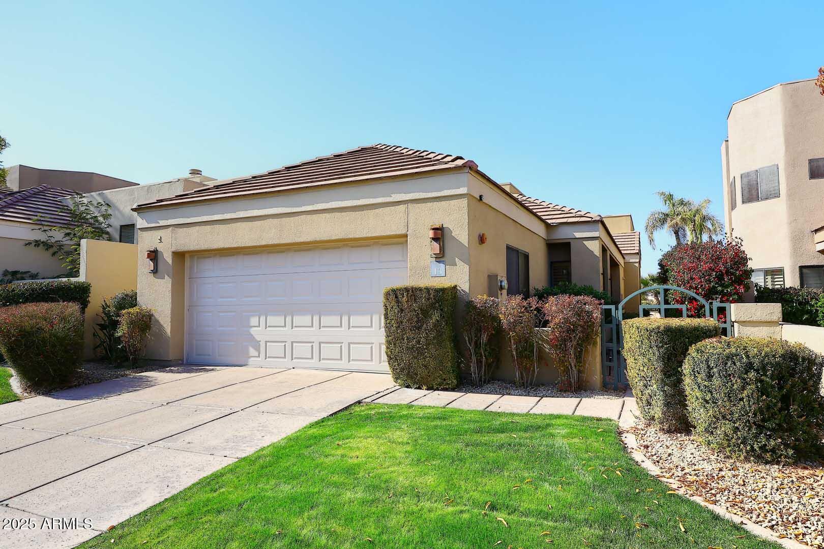 7740 East Gainey Ranch Road, Unit 13 Scottsdale, AZ 85258 - Photo 1 of 51 Front View