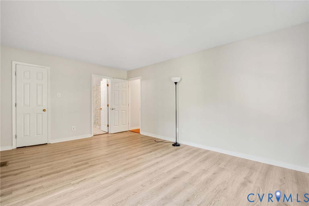 4820 Cedar Cliff Road Chester, VA 23831 - Photo 22 of 41 Neutral wall finishes, wood-finish flooring, and w