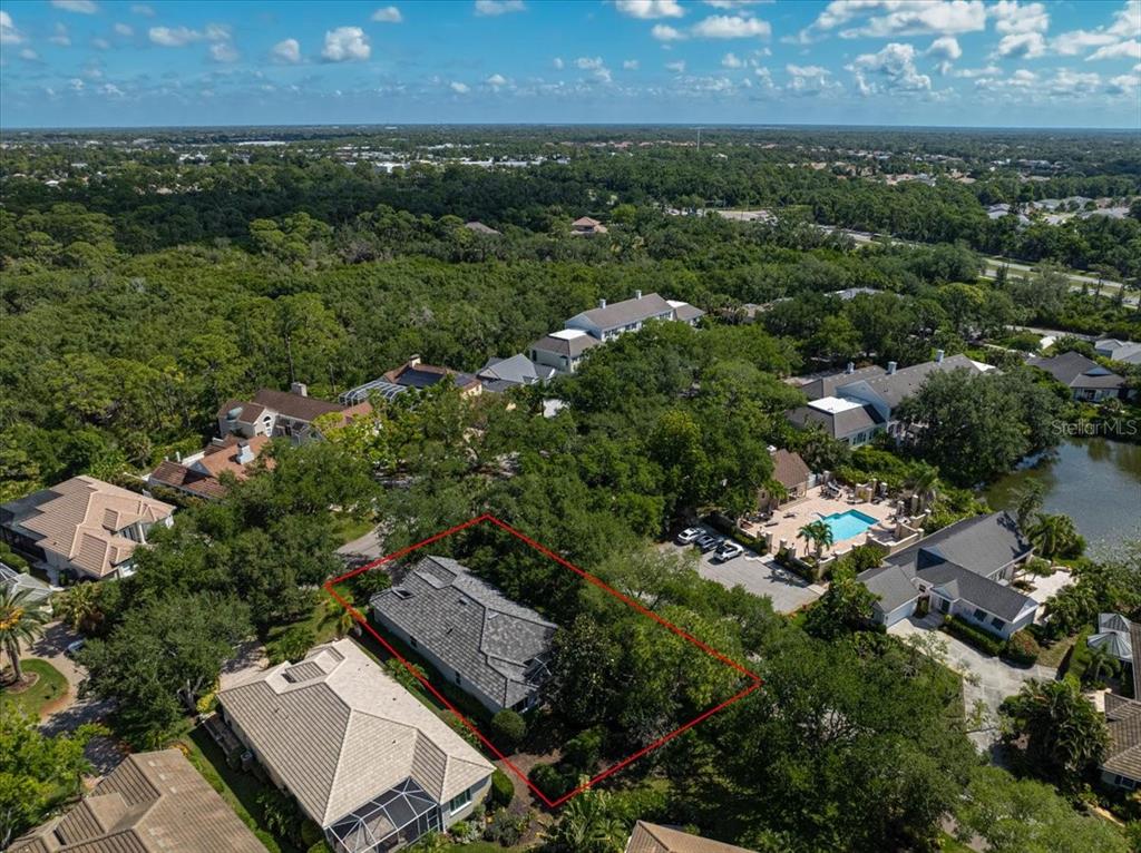 103 Bishopscourt Road Osprey, FL 34229 - Photo 2 of 55 an aerial view of a house with a yard