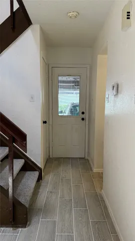 an empty room with a door