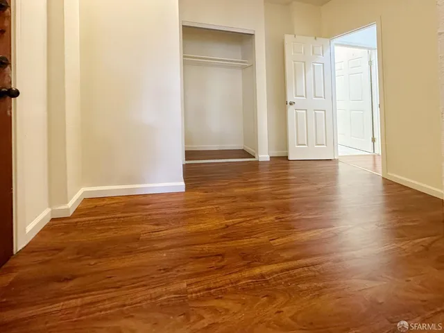 a bathroom with a sink toilet and mirror