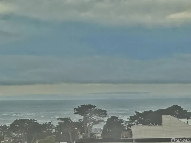 a kitchen with a refrigerator a sink and dishwasher