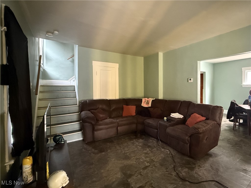 799 London Road Cleveland, OH 44110 - Photo 4 of 16 Living room featuring stairs