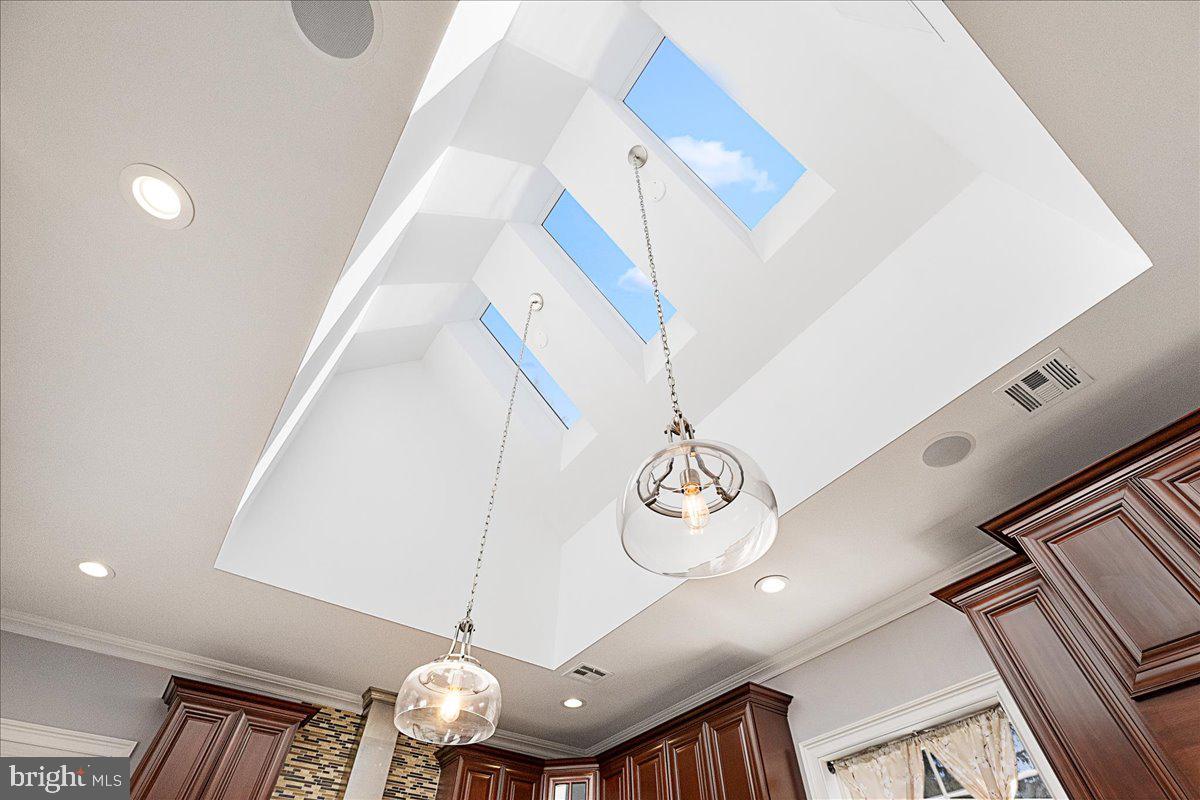 535 Village Road West Princeton Junction, NJ 08550 - Photo 11 of 51 a view of a hallway with a chandelier