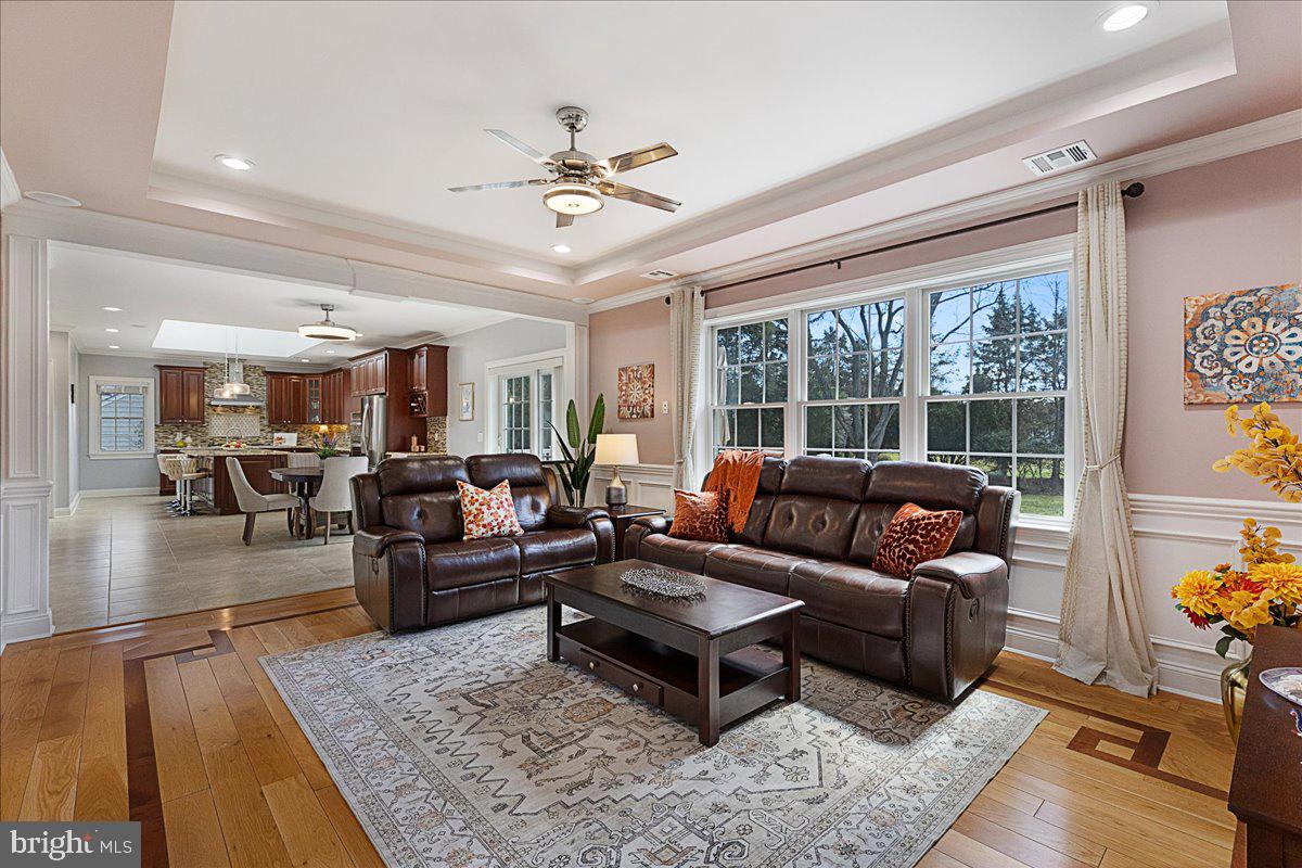 535 Village Road West Princeton Junction, NJ 08550 - Photo 13 of 51 a living room with furniture and a large window