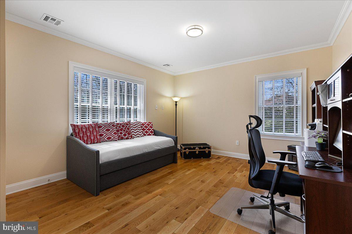 535 Village Road West Princeton Junction, NJ 08550 - Photo 15 of 51 a bedroom with furniture and a window