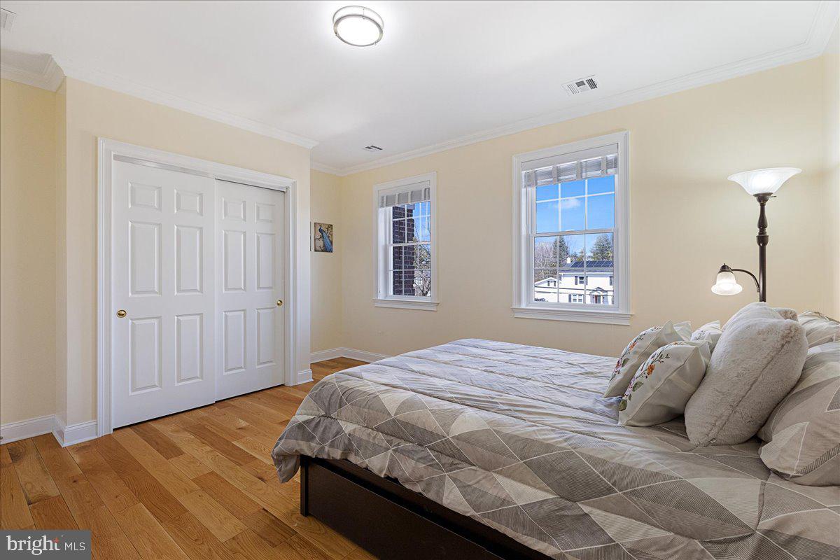 535 Village Road West Princeton Junction, NJ 08550 - Photo 29 of 51 a bedroom with a bed and a window