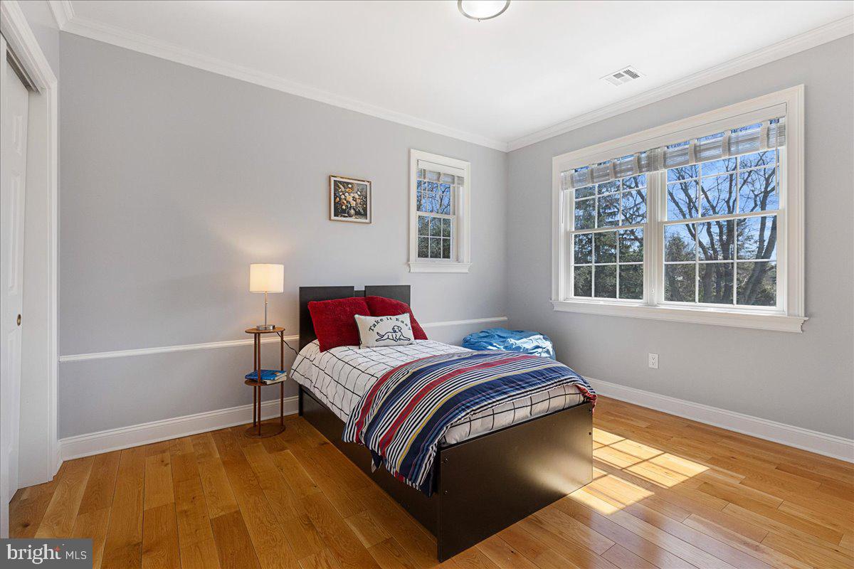 535 Village Road West Princeton Junction, NJ 08550 - Photo 30 of 51 a bedroom with a bed and a window