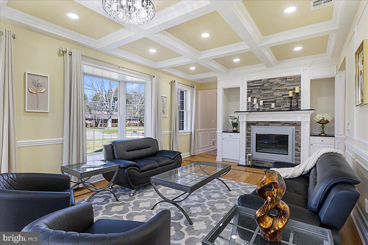 535 Village Road West Princeton Junction, NJ 08550 - Photo 4 of 51 a living room with furniture and a fireplace