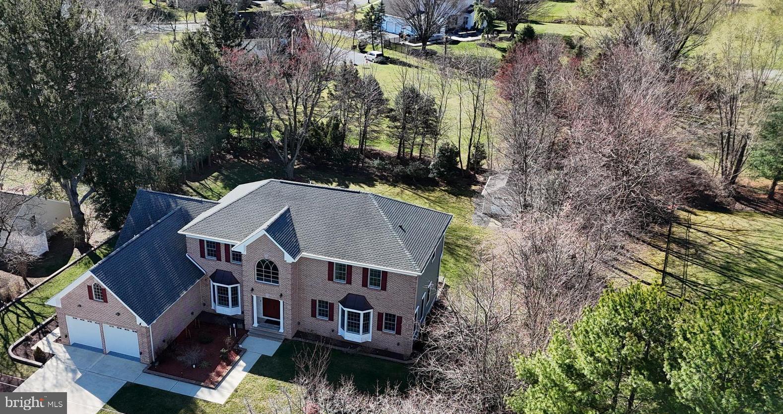 535 Village Road West Princeton Junction, NJ 08550 - Photo 44 of 51 an aerial view of a house with a yard
